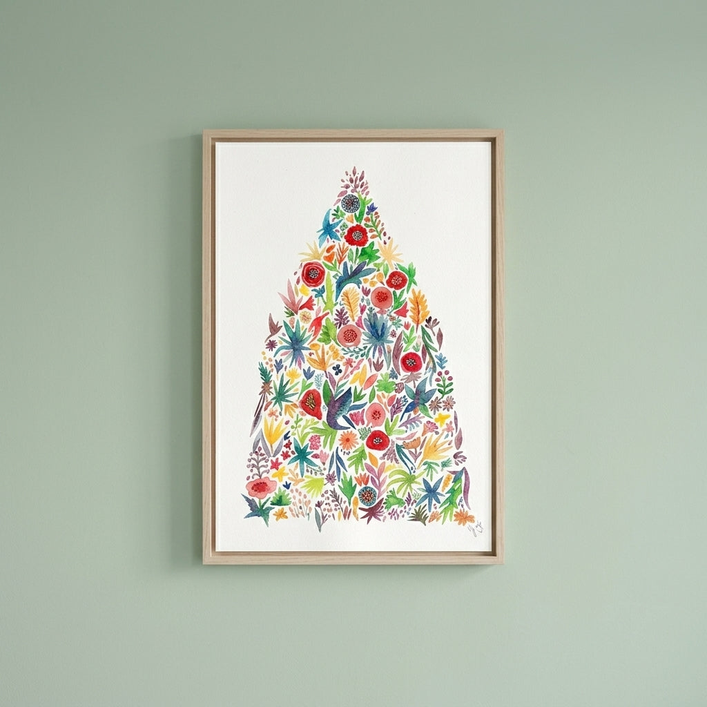 A framed botanical art print featuring a stylized Christmas tree composed of colorful winter flowers and leaves, hung on a light sage green wall.