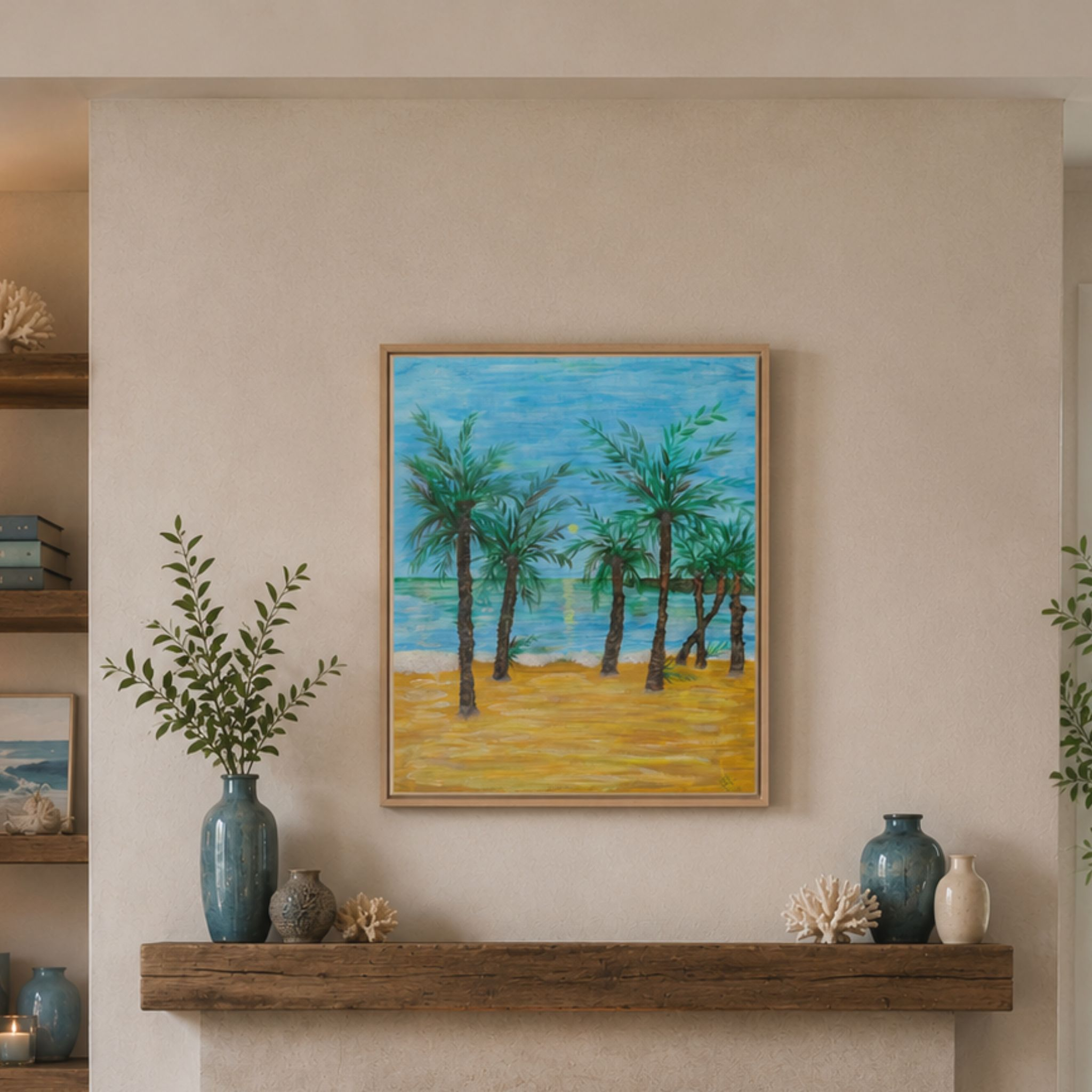 Framed beach scene painting on a wall above a wooden shelf with decorative items.