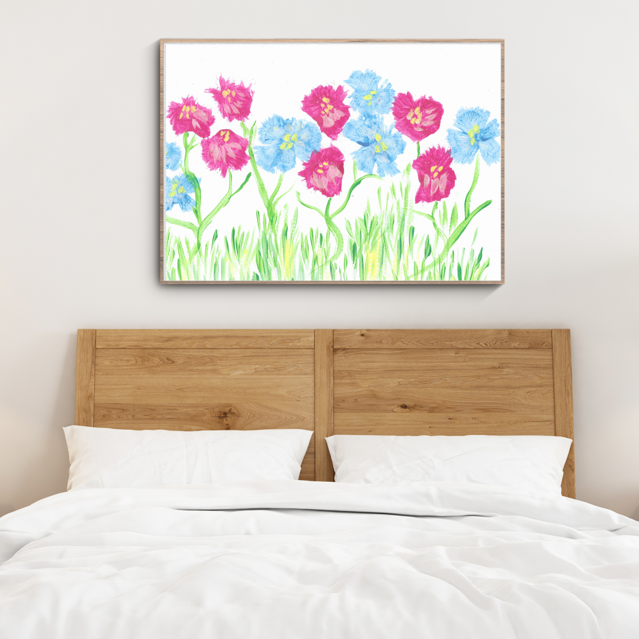 Art with flowers in modern bedroom. Colourful home decor.